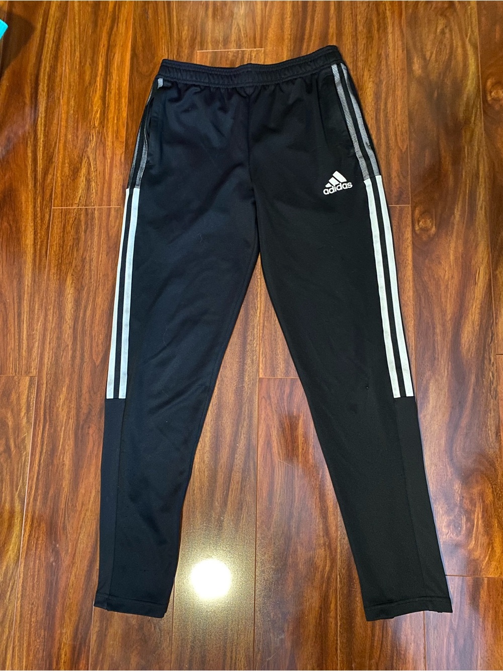 Adidas Black Three-Stripe Track Pants with zipper pockets